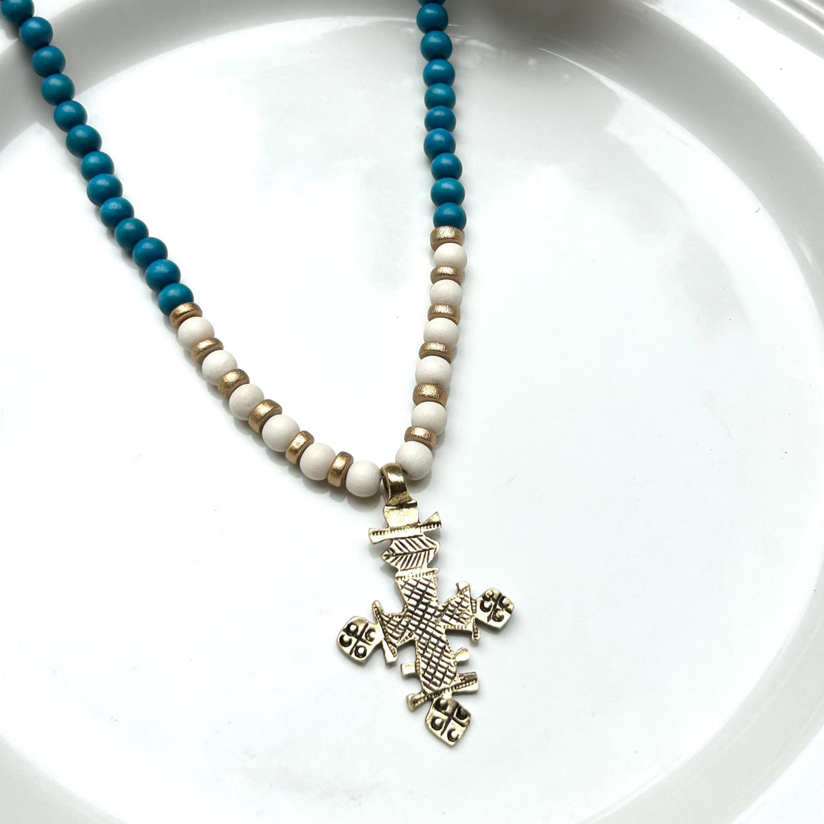 Golden Cross Pendant Necklace: Chunky Blue & White Wooden Beads