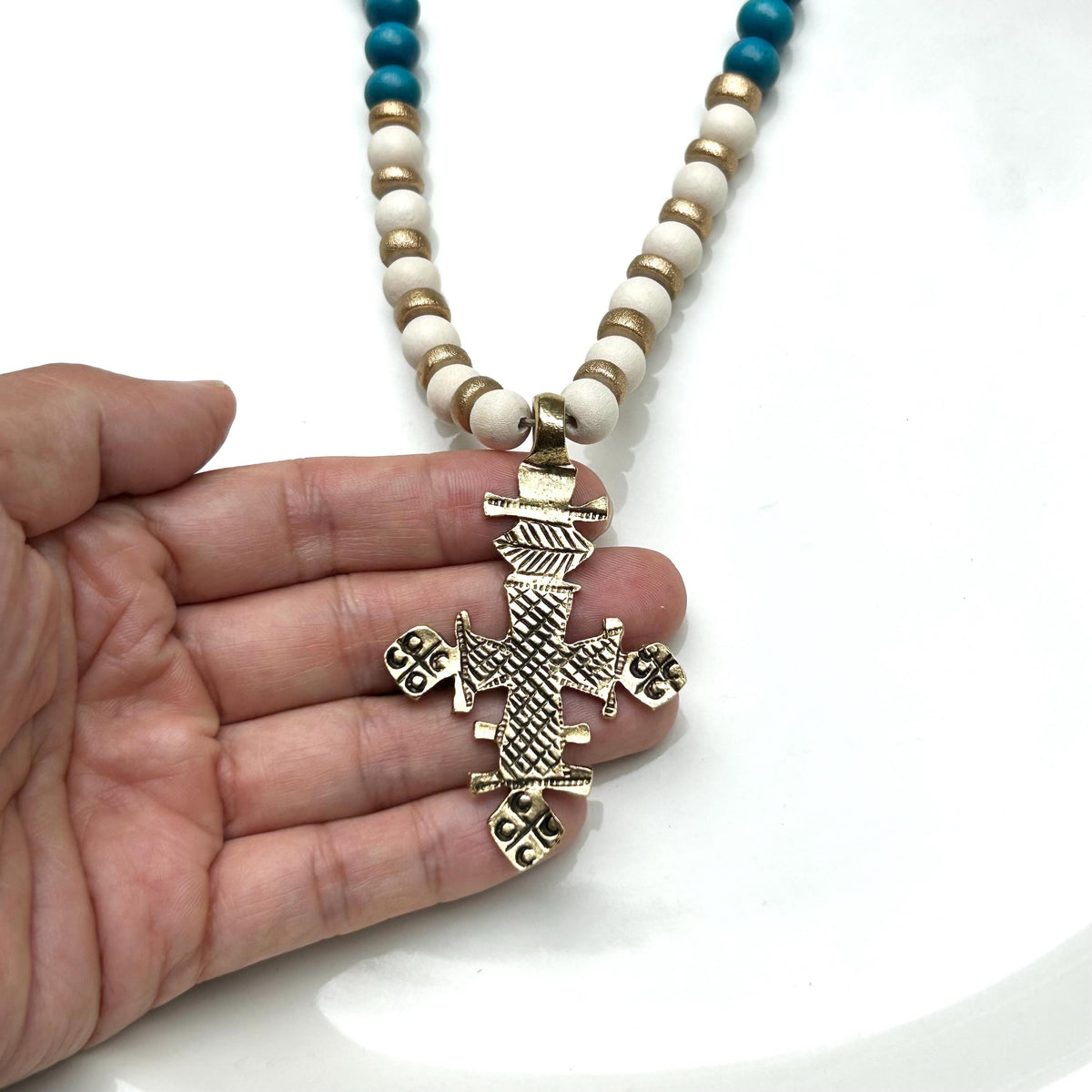 Golden Cross Pendant Necklace: Chunky Blue & White Wooden Beads